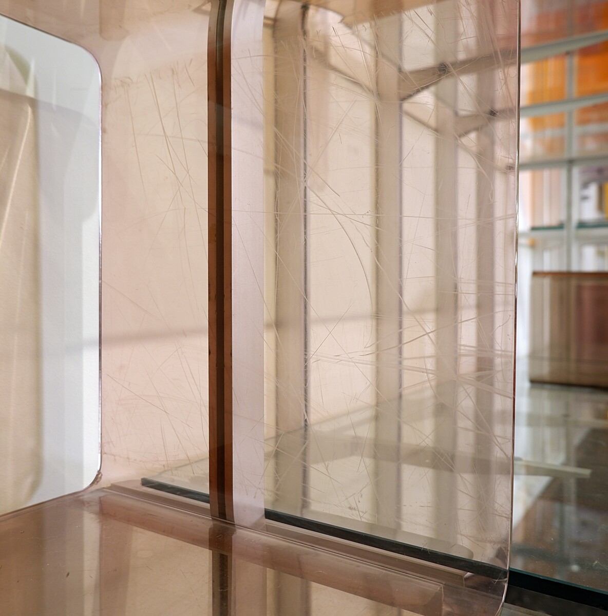 Modular wall shelf in brushed metal, glass and acrylic, in the style of Michel Ducaroy