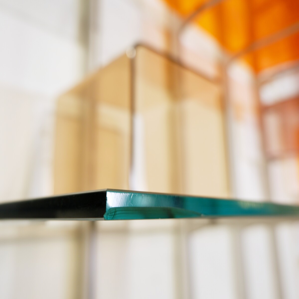Modular wall shelf in brushed metal, glass and acrylic, in the style of Michel Ducaroy