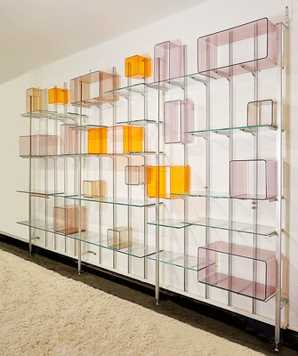 Modular wall shelf in brushed metal, glass and acrylic, in the style of Michel Ducaroy