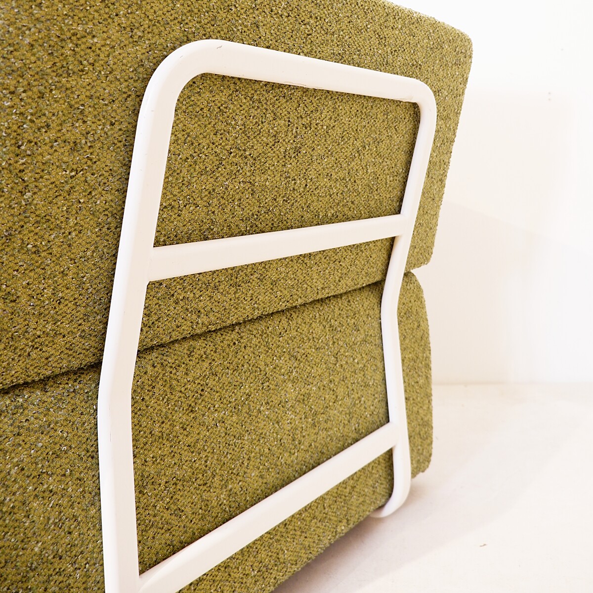 Pair of lounge chairs with white metal frame and new mottled green upholstery