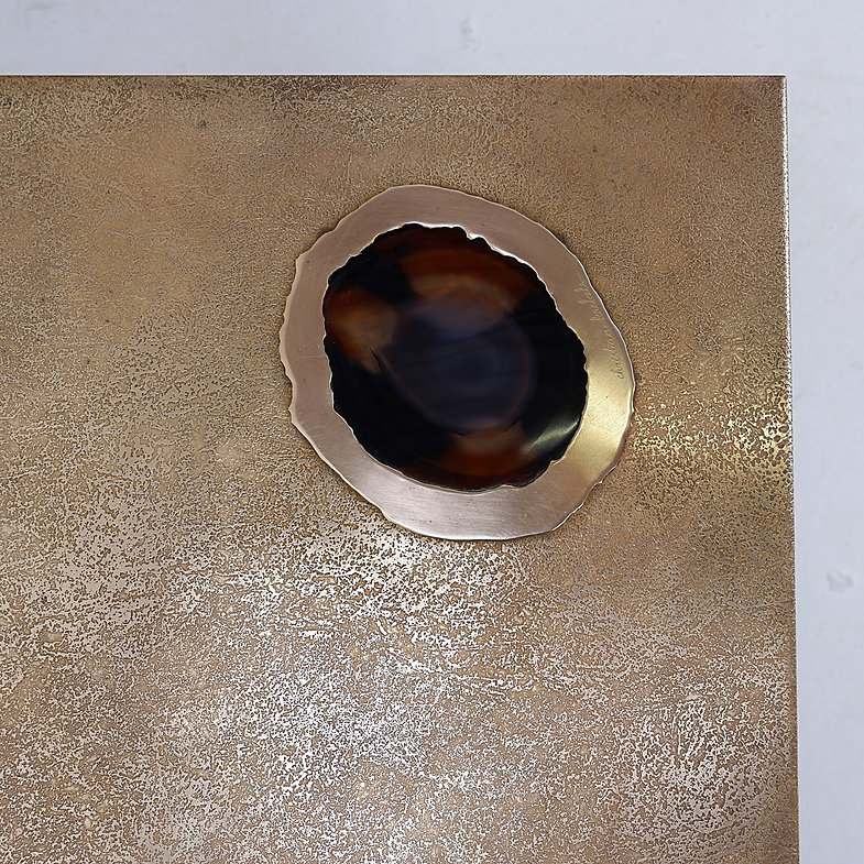 Acid-etched brass coffee table top by Christian Krekels with an agate stone