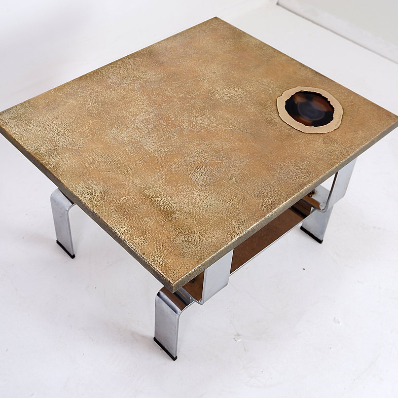 Acid-etched brass coffee table top by Christian Krekels with an agate stone