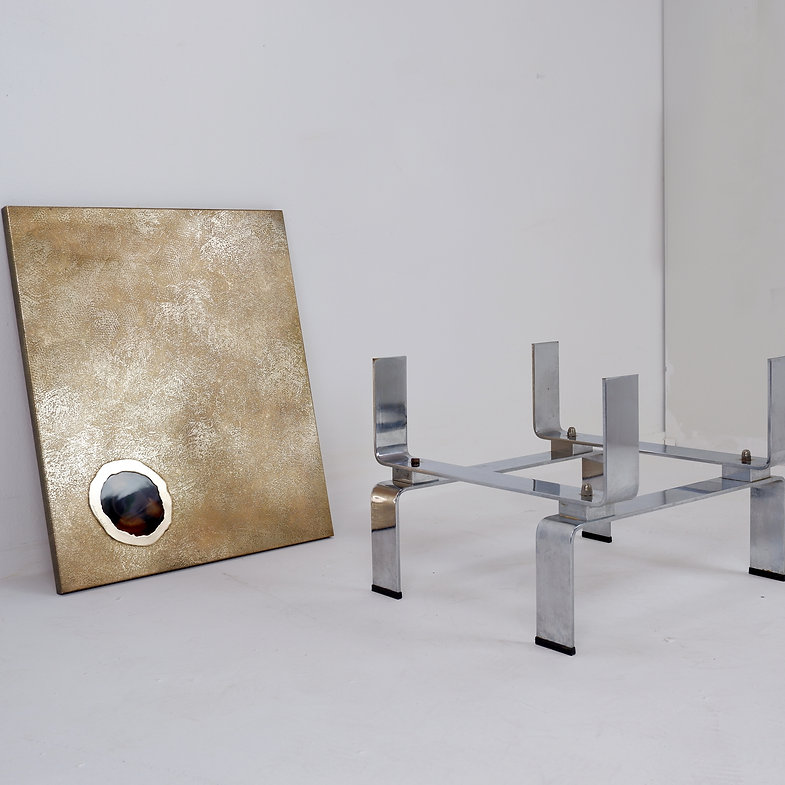 Acid-etched brass coffee table top by Christian Krekels with an agate stone