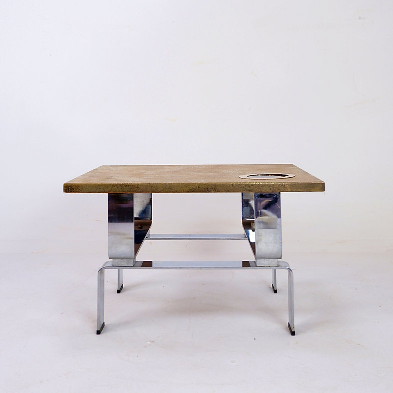 Acid-etched brass coffee table top by Christian Krekels with an agate stone