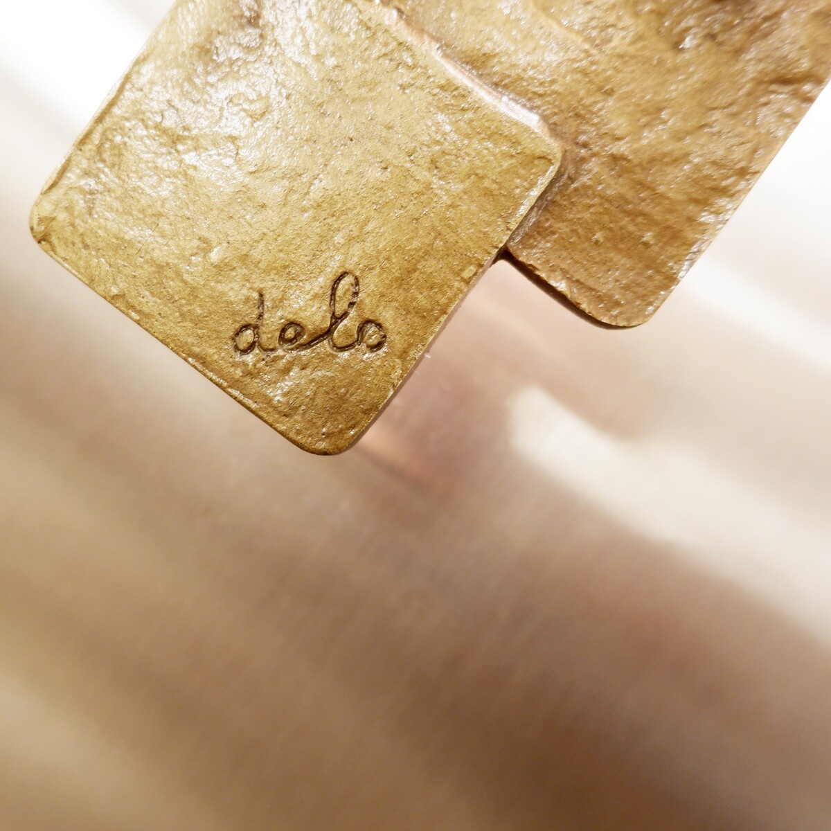 Brutalist bronze wall sconce by Maxime Delo, Italy, 1970s