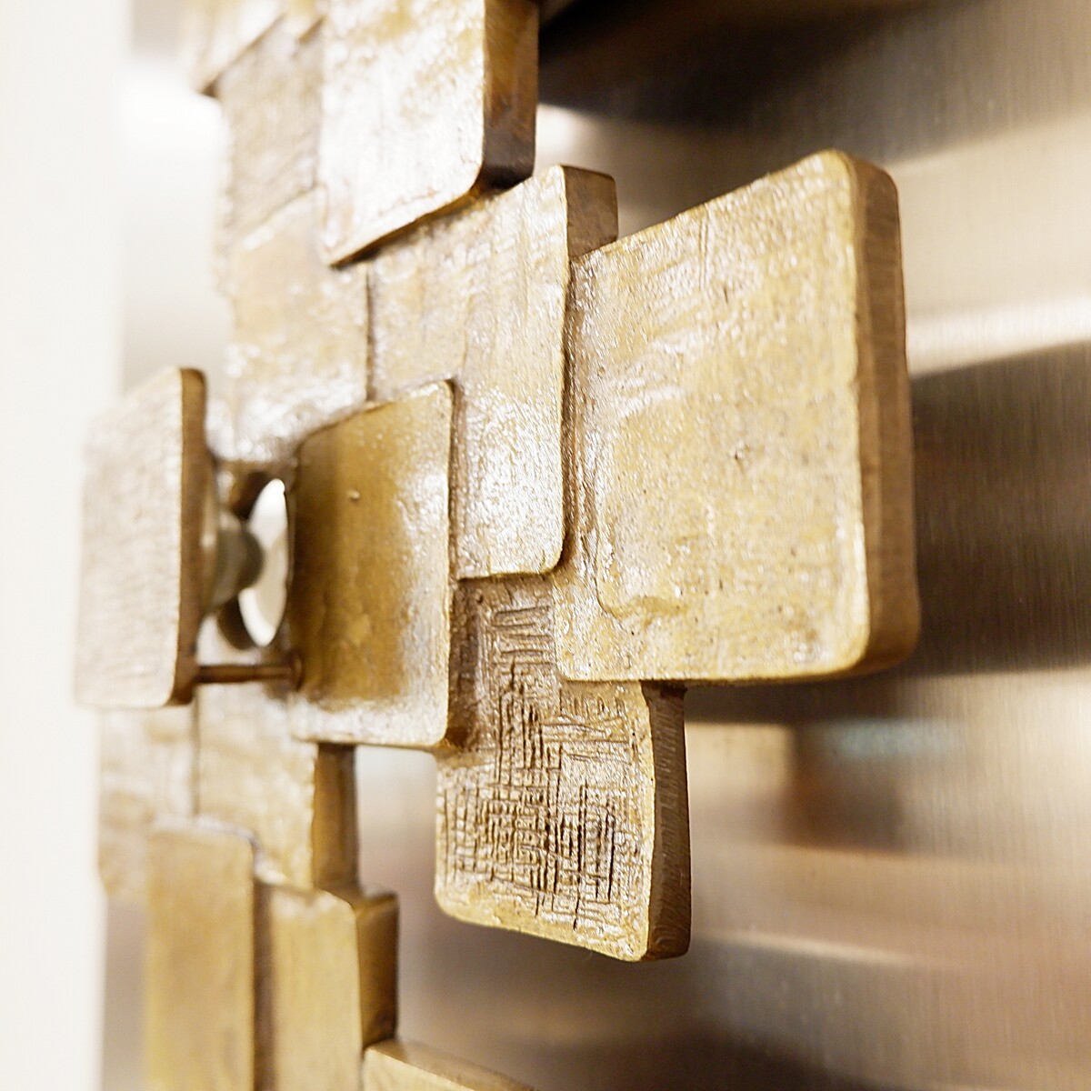 Brutalist bronze wall sconce by Maxime Delo, Italy, 1970s