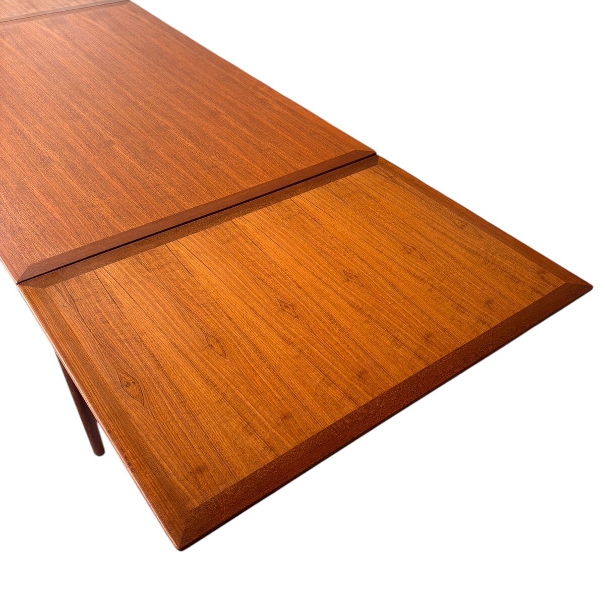 Extandable teak dining table with 'Made in Denmark' stamp