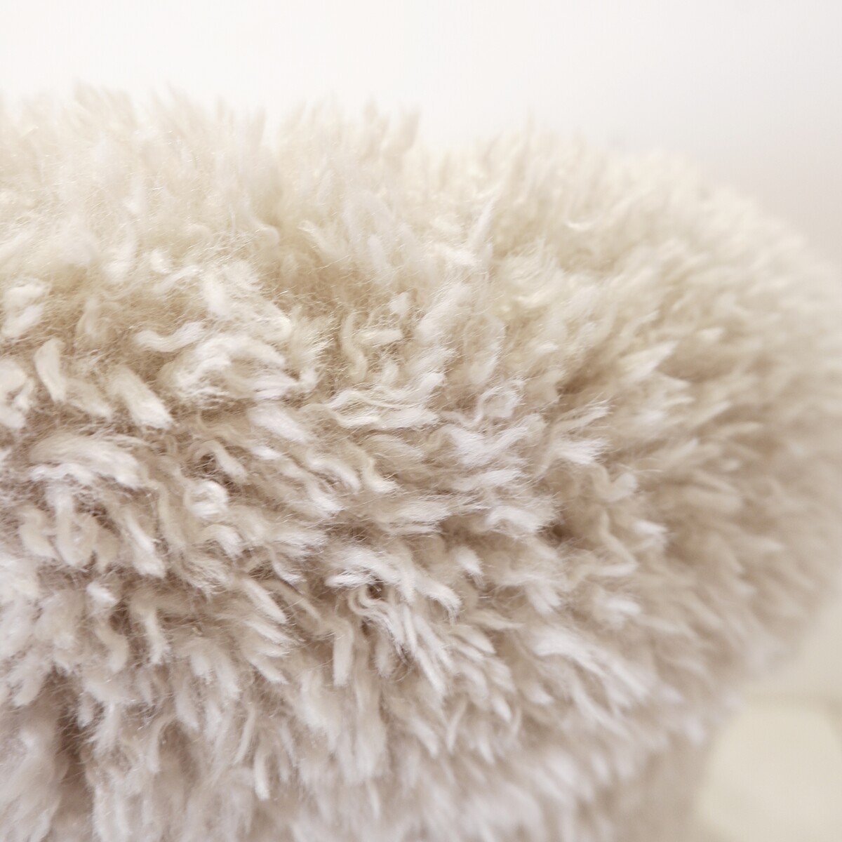 Faux sheepskin armchair - new light grey upholstery