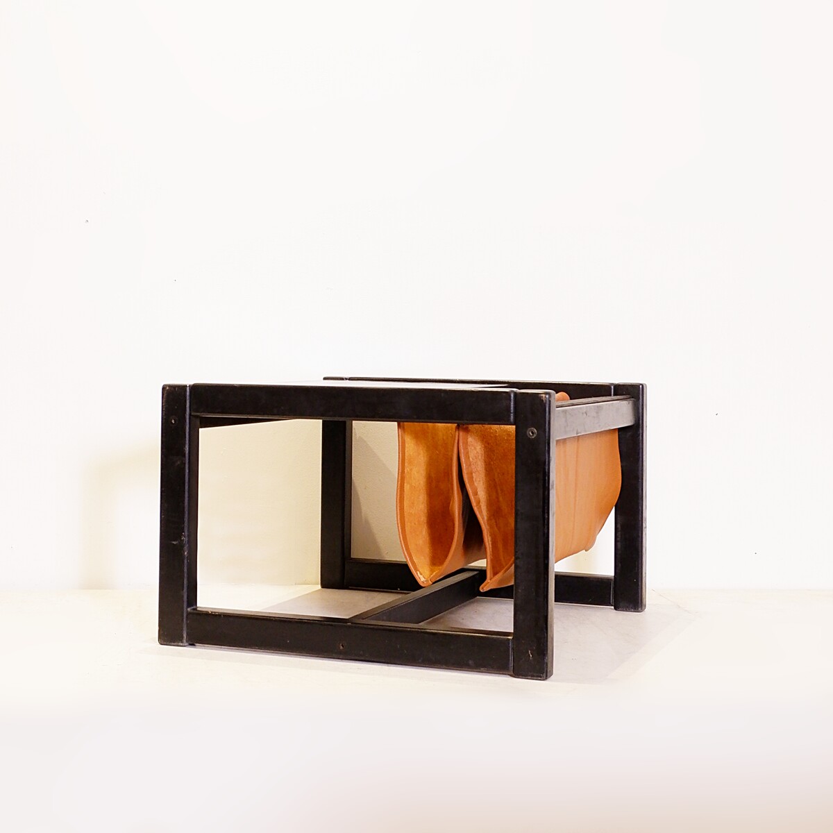 Mid-Century Coffee table with leather magazine rack