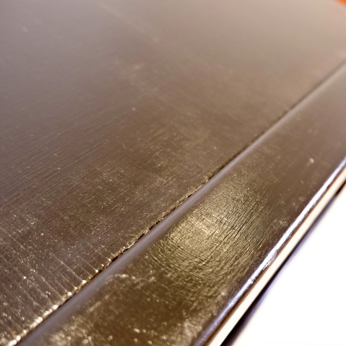 Mid-Century Coffee table with leather magazine rack