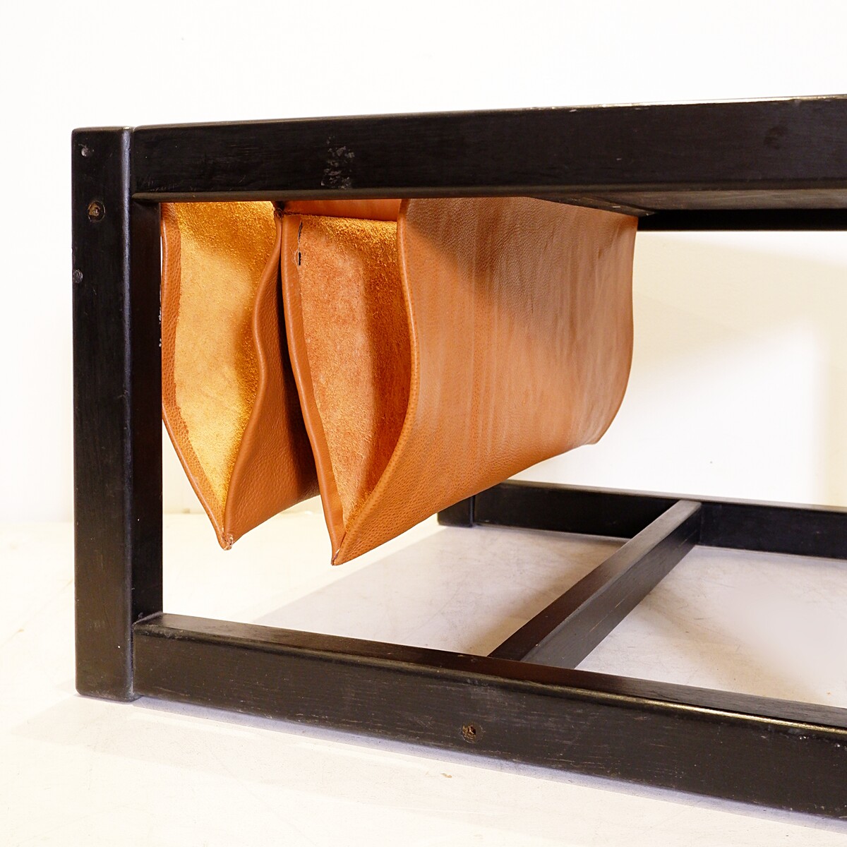 Mid-Century Coffee table with leather magazine rack