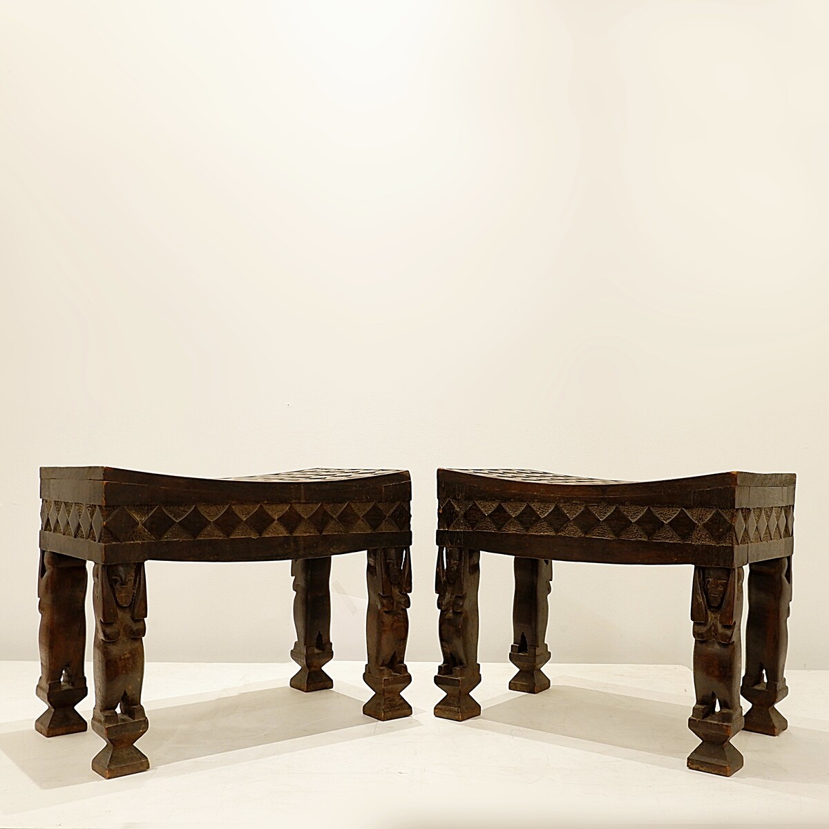 Pair of African carved wooden stools