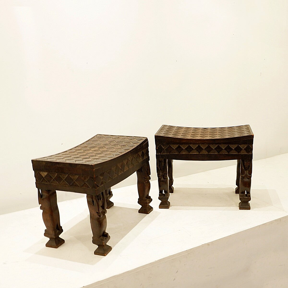 Pair of African carved wooden stools