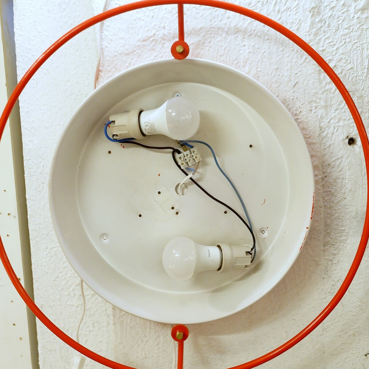 Pair of metal wall lights and frosted glass disc