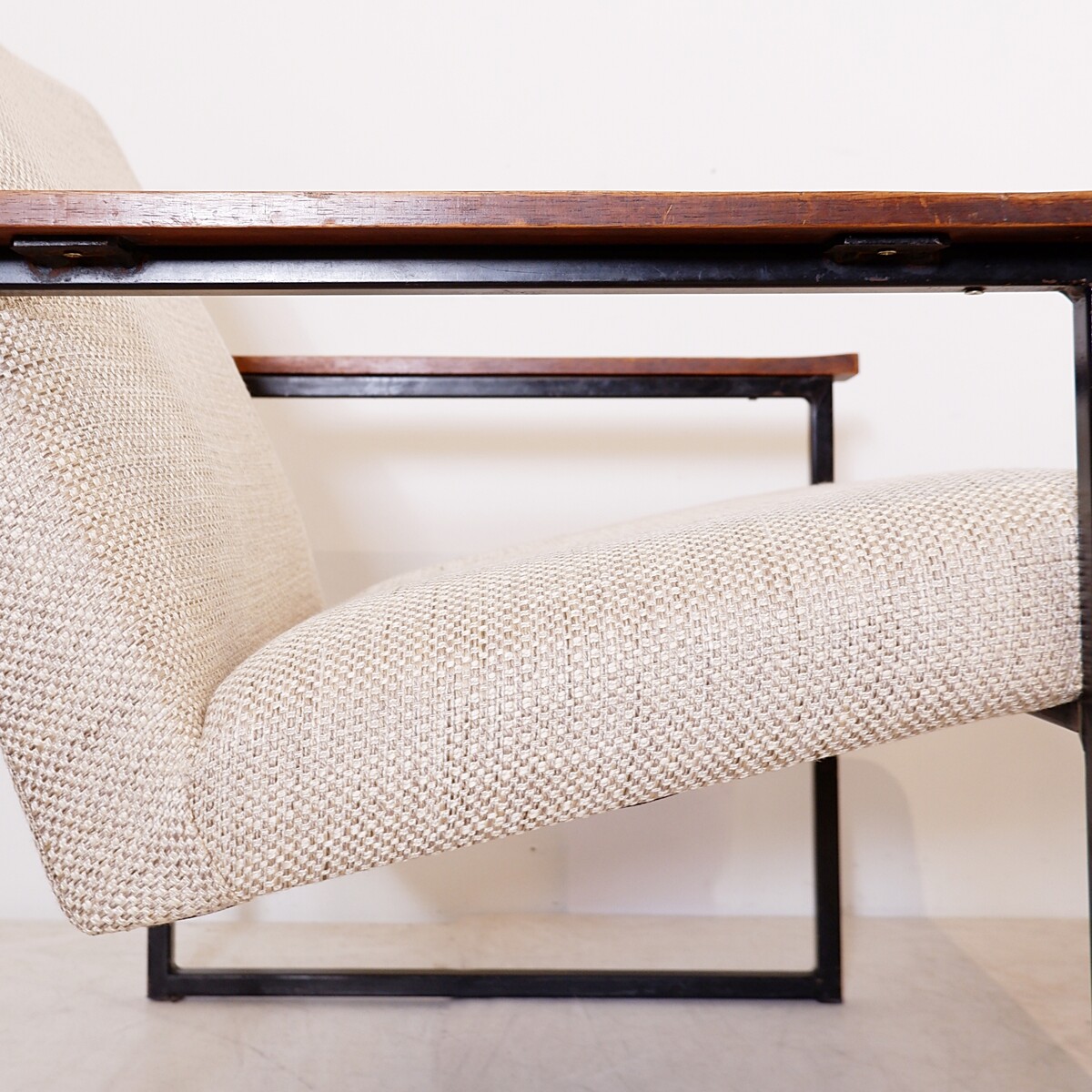 Pair of mid-century armchairs with black metal frames and wooden armrests - New Upholstery