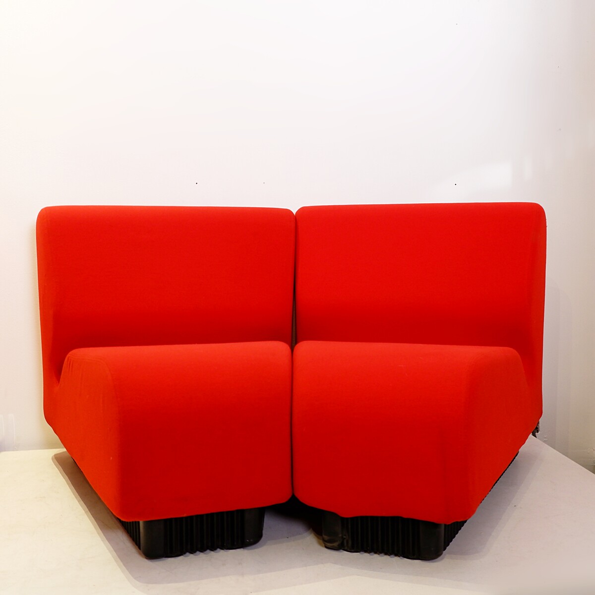 Pair of red Miller armchairs