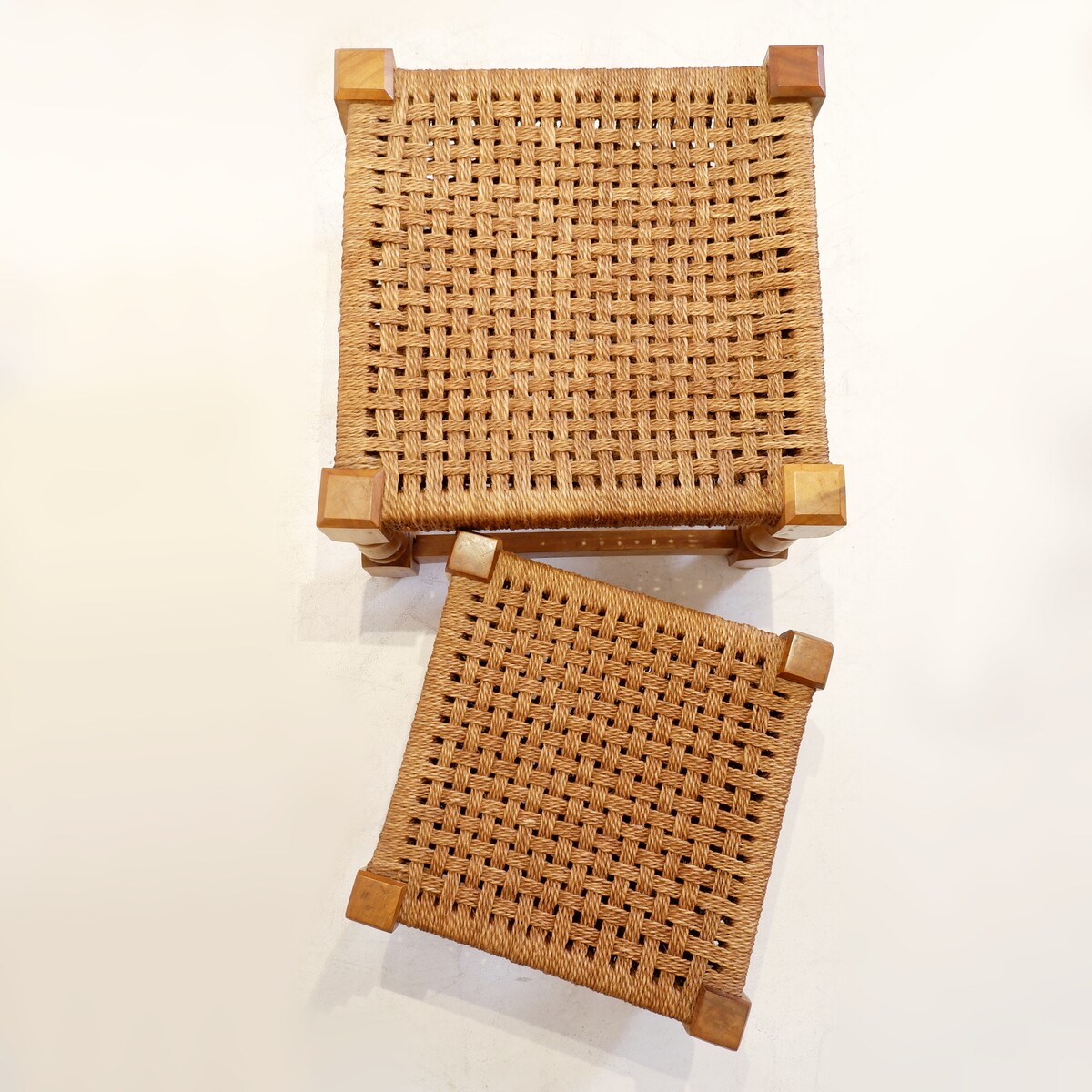 Pair of vintage brutalist stools or footrests in rope and wood, 1960s