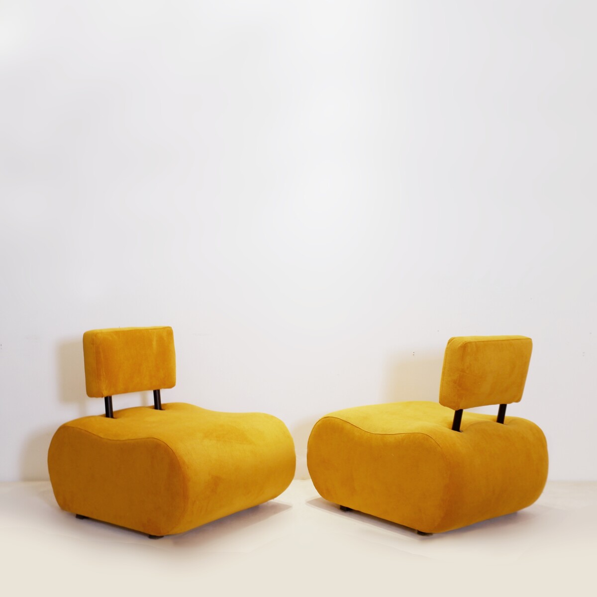 Pair of vintage lounge chairs with new yellow corduroy upholstery