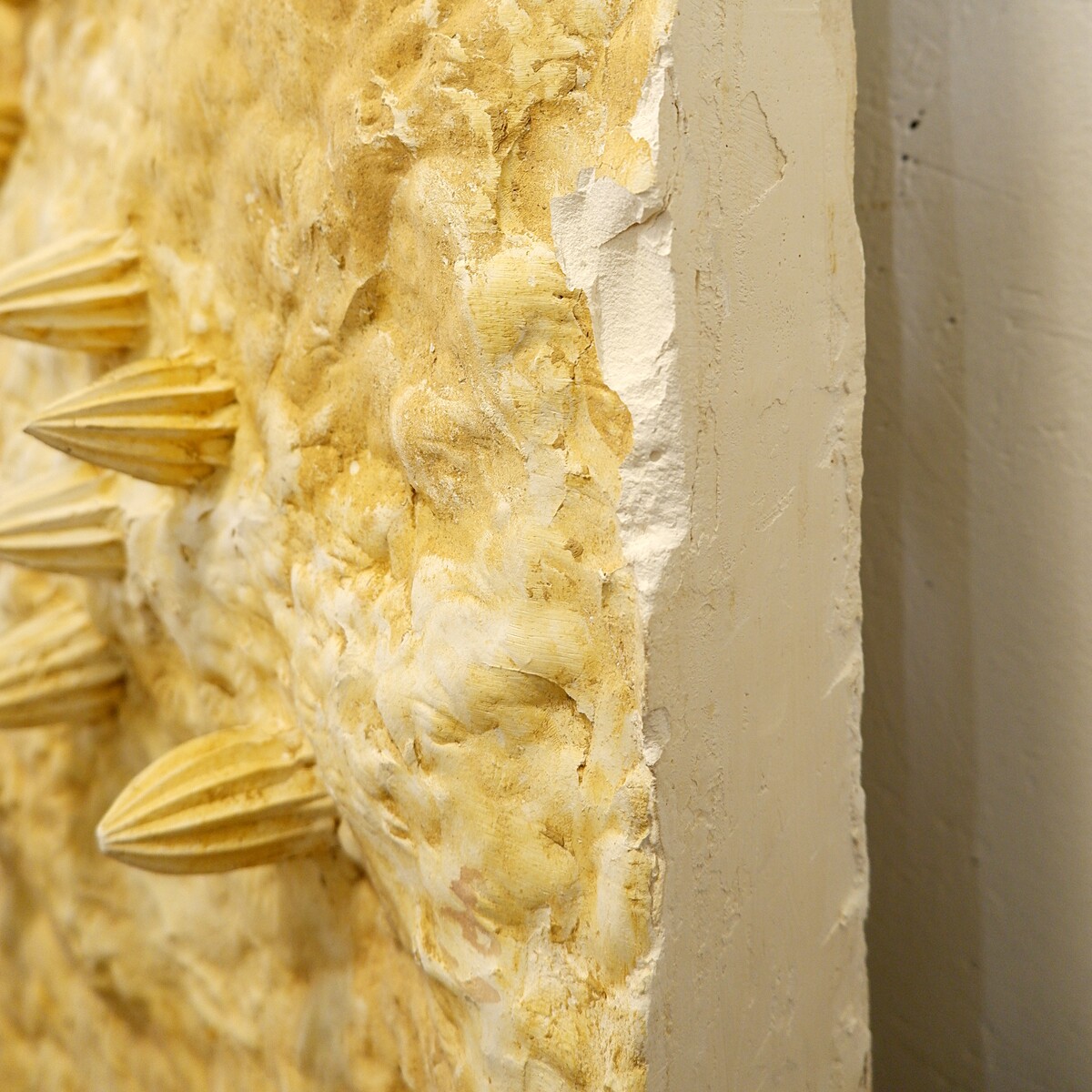 Plaster wall sculpture