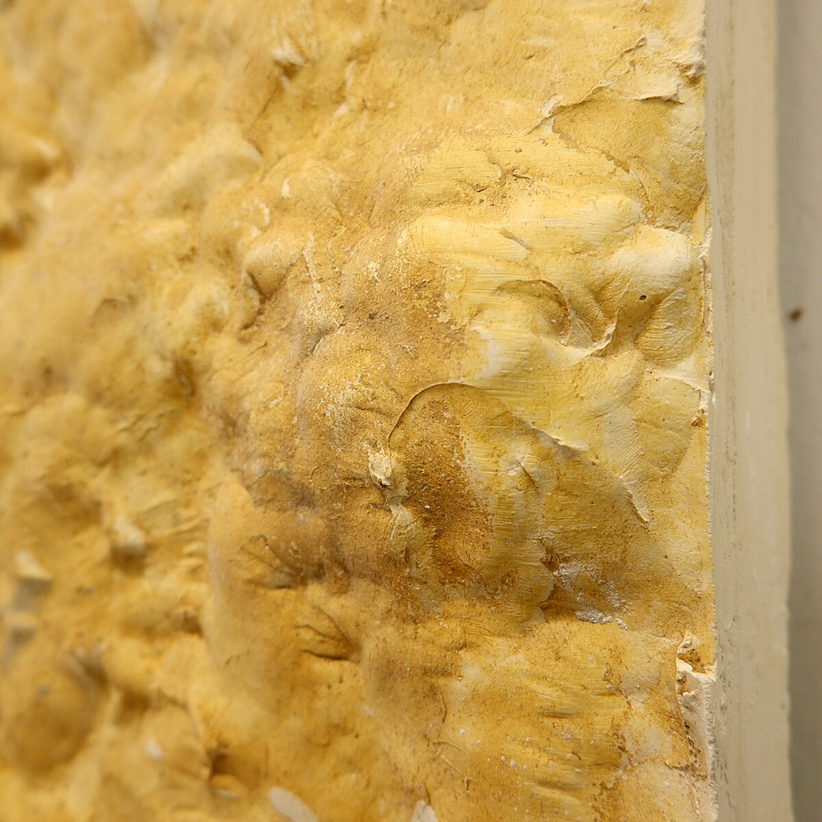 Plaster wall sculpture