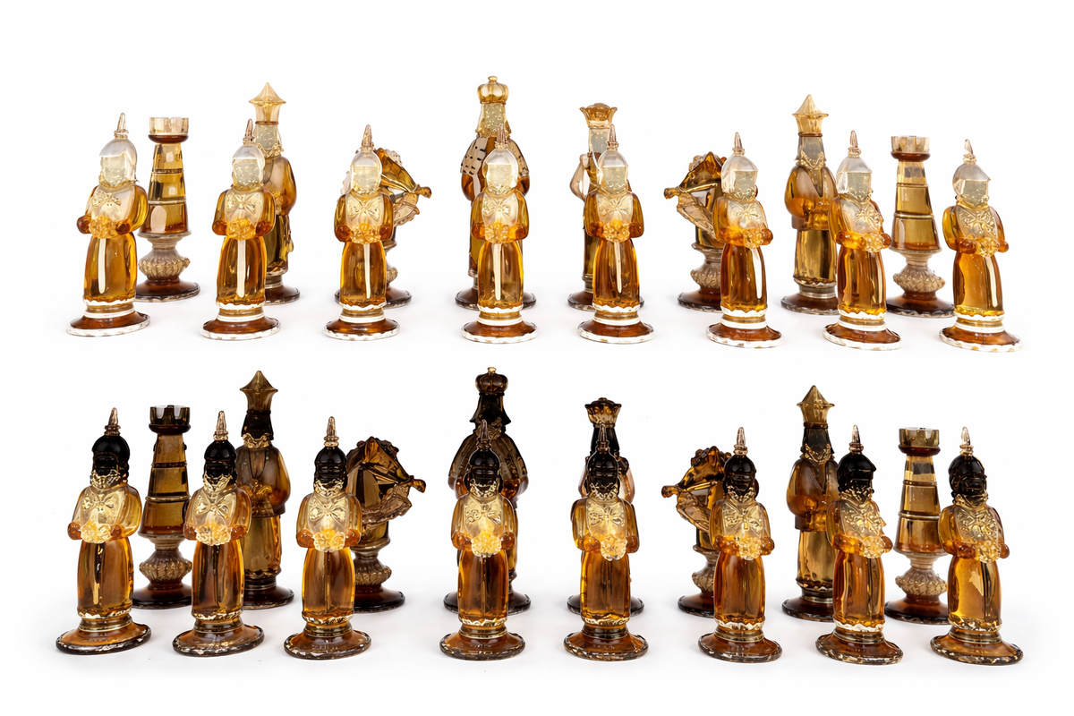 Rare Chess Set Composed of 32 Solid Amber Glass Pieces, finished in white or black pâte de verre, with gold leaf decoration, Pauly & C, Murano, 1930s