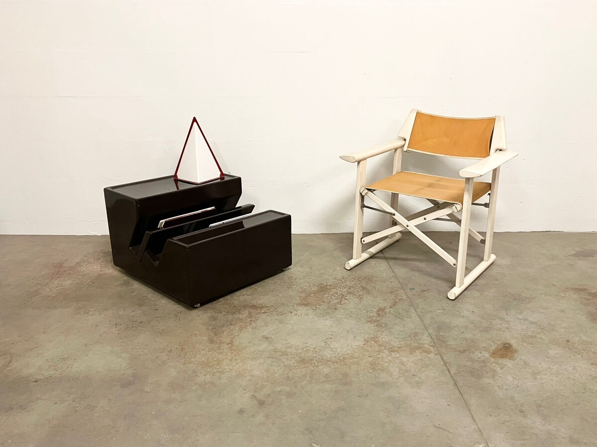 Sculptural coffee table with brown fibreglass storage on castors , Italy 1970