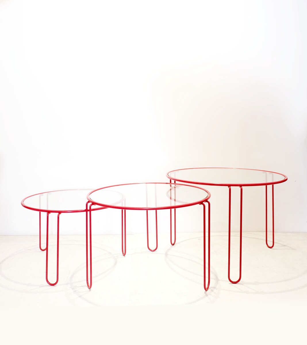 Set of 3 minimalist round nesting tables, 1970s