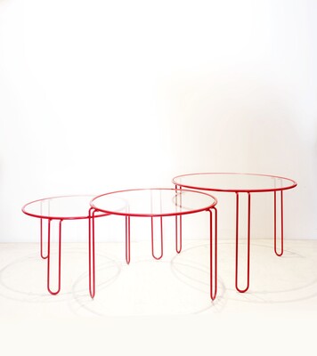 Set of 3 minimalist round nesting tables, 1970s