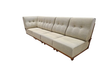 Set of four Elmyre armless chairs, including one corner unit, in light oak