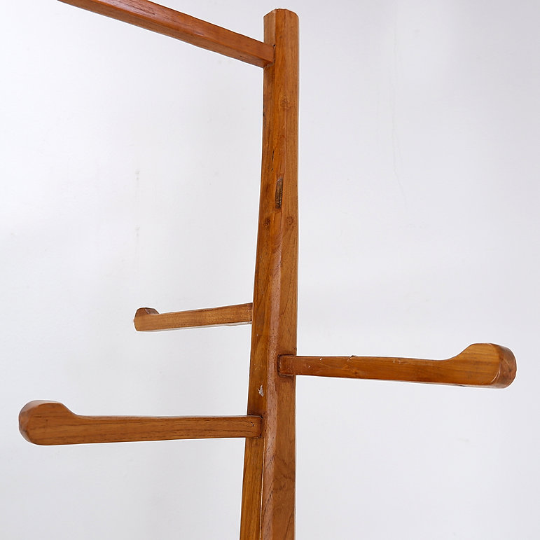 Vintage Brutalist wood standing coat rack