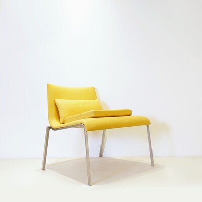 Yellow leather lounge chair by Ligne Roset